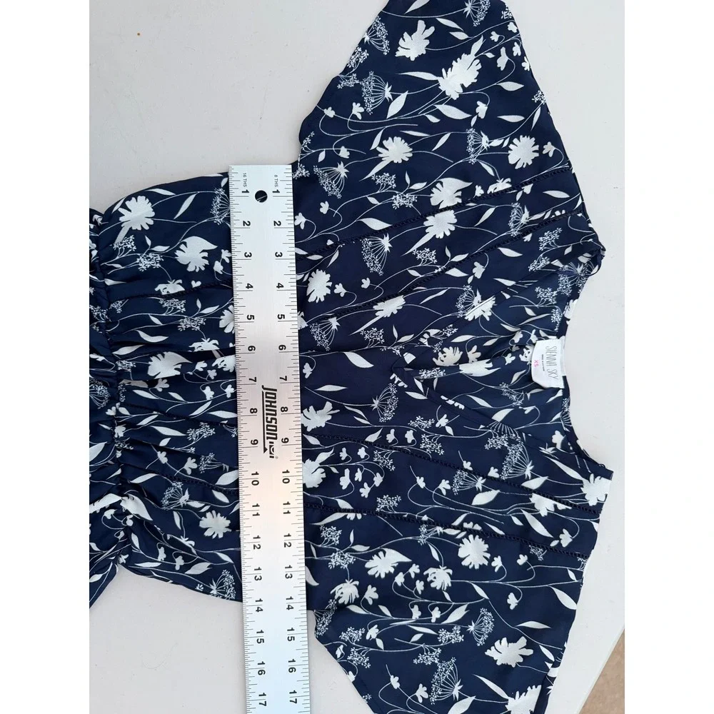 Sienna Sky Navy Blue White Floral Peplum V-Neck Flutter‎ Sleeve Top XS